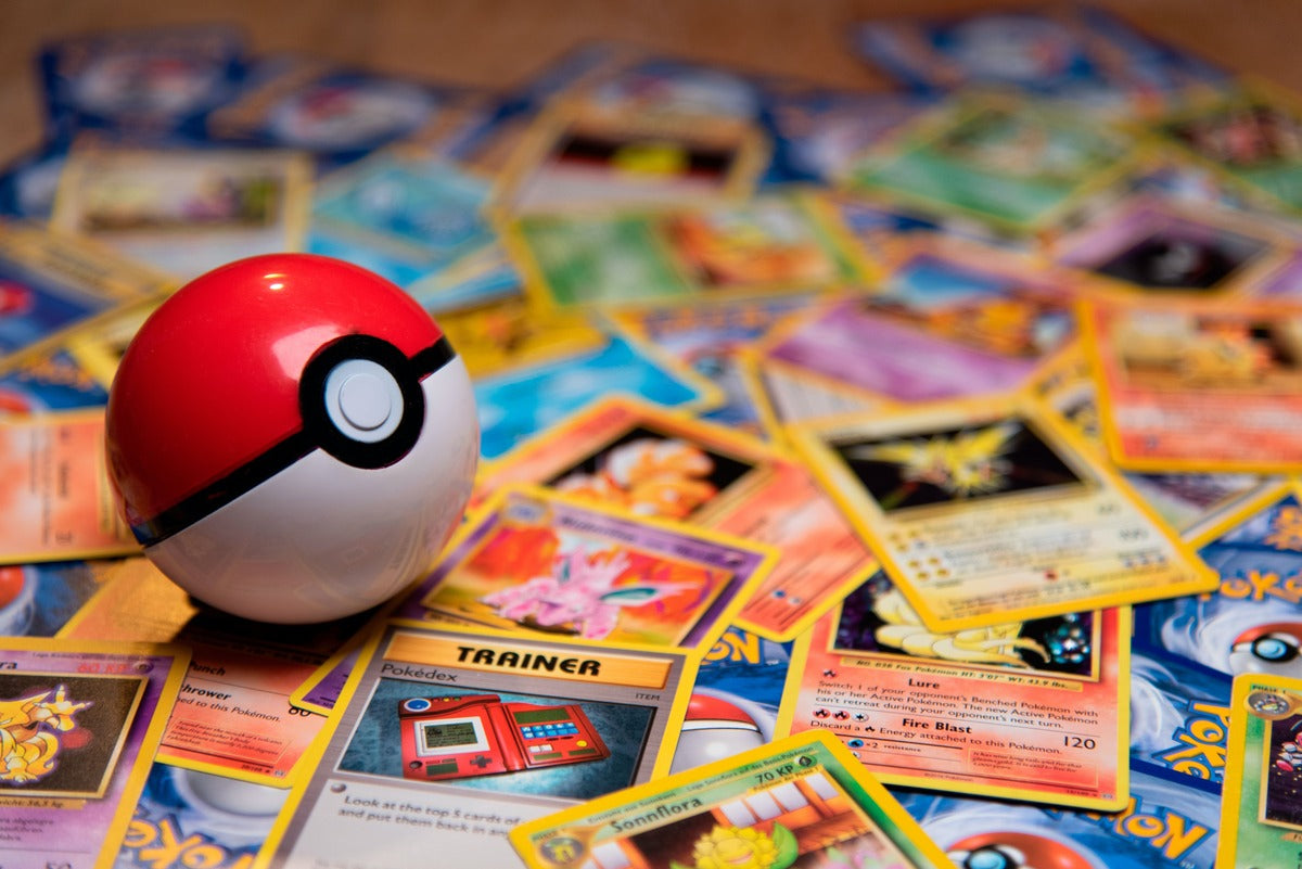 Pokémon collectible card game and a pokeball